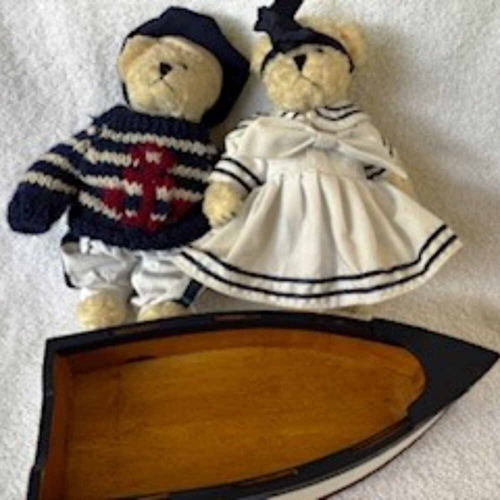 Two collectible jointed nautical themed bears in Titanic lifeboat